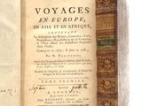 an old book opened to a page with a picture of a man on it