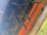 a close up of a tire on the side of a truck