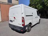 a white van that is parked in a parking lot