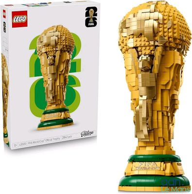 a lego sculpture of a soccer trophy in front of a box of legos