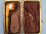 an open suitcase with a hair dryer and a hair dryer in it