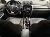 the interior of a car with a steering wheel, dashboard, and dashboard controls