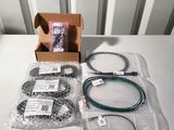 an image of a box of cables and wires sitting on a table