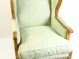 une image représentant une chaise dont l'assise est recouverte de tissu vert