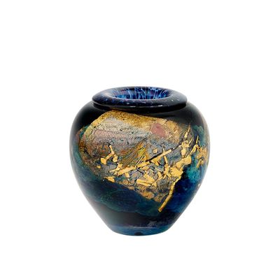 a blue vase with a gold leaf design on it