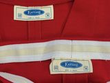 the shirt is red and white with a white stripe around the collar