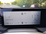 a picture of a car dashboard with a display on it