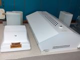 a white computer sitting on top of a counter in a room