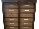 an image of a wooden chest of drawers