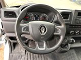 the interior of a car with a steering wheel and dashboard controls