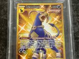 a pokemon card in a plastic case on a table