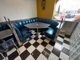 a black and white checkered floor in a restaurant