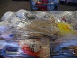 a plastic container filled with plastic items in a store