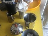 a yellow table with a yellow table cloth and cups on it