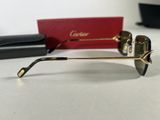 the glasses are on the table next to a red box