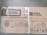 a cardboard box with a label on it sitting on a table