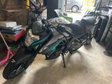 a motorcycle that is parked in a garage