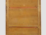 an old wooden box with a red line on the side