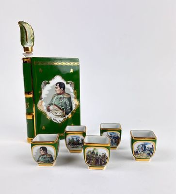 five cups and a box with a picture of a woman