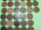 a lot of coins that are on the table