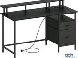 a black computer desk with two drawers and a keyboard on top