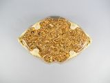 a bag of granola sitting on a white surface