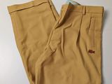 a close up of a pair of tan pants on a table