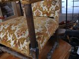 a chair that is sitting on top of a wooden table
