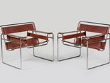 pair of chrome and leather cantile chairs by marcel knoller for knoller