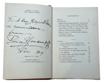 an open book with a handwritten page on the front and a handwritten page on the back