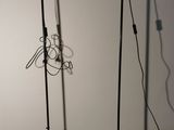 two lamps that are sitting on a black table