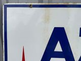 a blue and white sign with the letter a on it