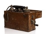 an old wooden box with a bunch of tools inside of it