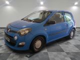 a picture of a small blue car parked in a garage