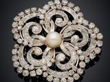 an antique pearl and diamond broochle