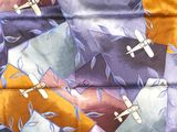 a picture of a colorful tie with airplanes on it