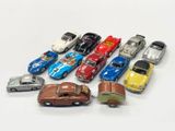 a lot of toy cars that are on the table