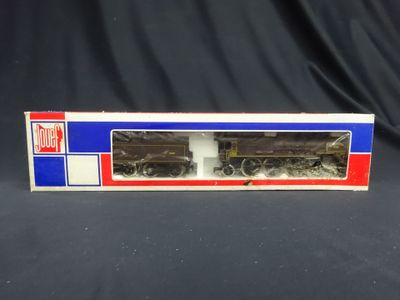 a box with a train on it on a black background