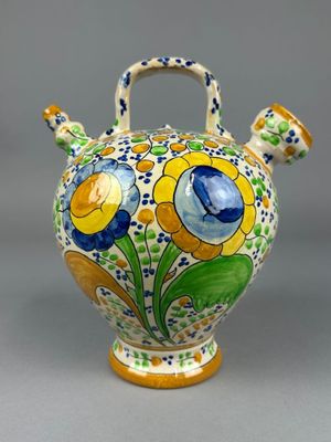 ESPAGNE - PICHET en faïence à décor floral.