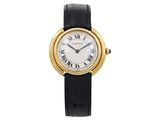 a close up of a wrist watch with roman numerals on it