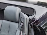 an image of a car seat with a bag in the back