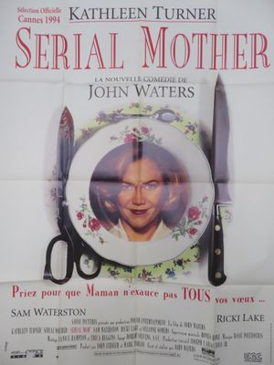 une affiche représentant une femme tenant un couteau et une assiette sur laquelle figure le portrait d'une femme