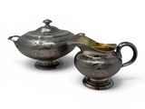 a pair of silverplated sugar and creamers