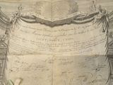 an old document with writing on it sitting on a table