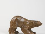an image of a wooden bear statue on a white background