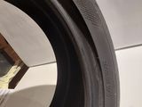 a close up of a tire with a hole in it