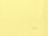 an image of a drawing of a man ' s face on a piece of yellow paper