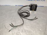 a close up of an electrical device on a table