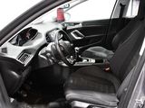 a picture of the inside of a car with the driver ' s seat up