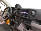 the interior of a vehicle with a steering wheel and dashboard controls